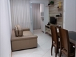 Sala em dois ambientes e varanda